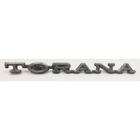 TORANA LX ORIGINAL HOLDEN FRONT PANEL BADGE 9944184