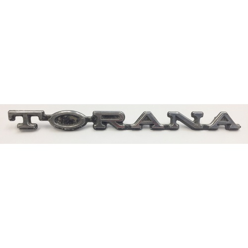 TORANA LX ORIGINAL HOLDEN FRONT PANEL BADGE 9944184