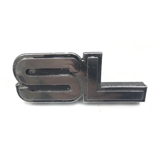 TORANA UC SL GRILE BADGE GENUINE SECONDHAND 9929525