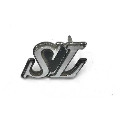 HOLDEN HZ SL USED BADGE BOOT OR GUARD GENUINE SECONDHAND-E7