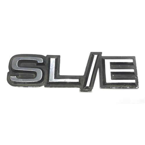 HOLDEN HZ SLE USED GUARD BADGE ORIGINAL SECONDHAND 92000451